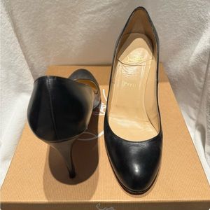 Black leather Christian Louboutin heel